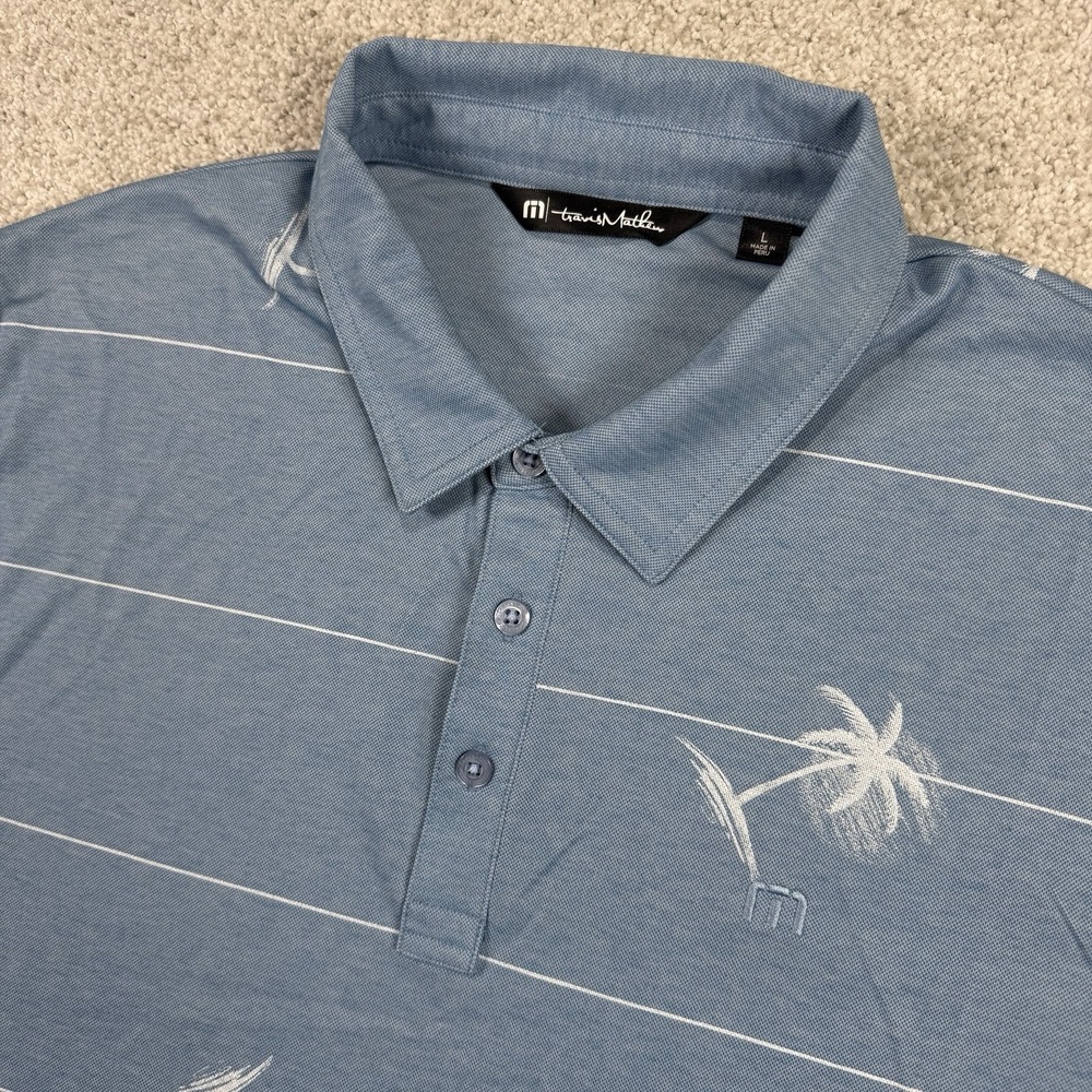 TravisMathew Men's Light Blue Striped Polo with Palm Tree Embroidery